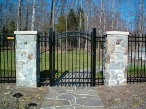 Steel Fence with an Arched Gate Driveway Hercules Fence Newport News